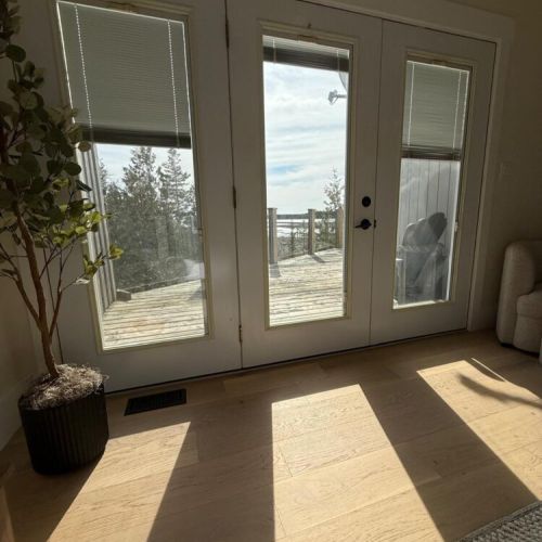 Wake up and step directly onto the deck to enjoy morning coffee with panoramic lake views—just steps from your bed.
