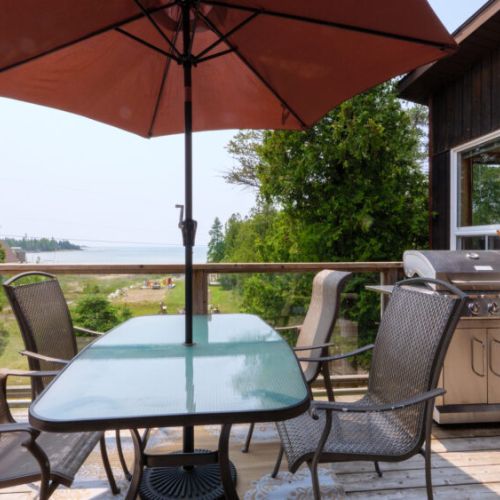 Get your grill on with a grand view of the water off of the rear deck.