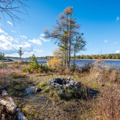 Gather around the firepit along the Lake.
