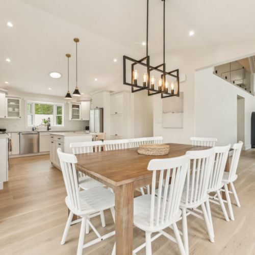 Gather around the farmhouse table for memorable meals with loved ones—comfort and style in your ideal rental retreat.