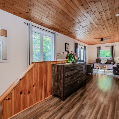 A beautifully designed hallway connects the living area to the comfortable bedrooms, giving a smooth flow throughout the home.
