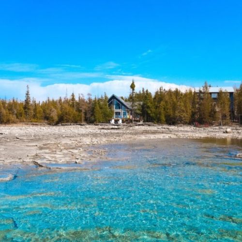 Stunning waterfront setting with crystal-clear waters just steps away.
