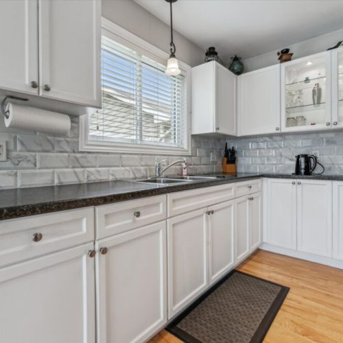 Clean, bright, and functional — this kitchen space is stocked for your stay, whether you're making breakfast or a full cottage dinner.