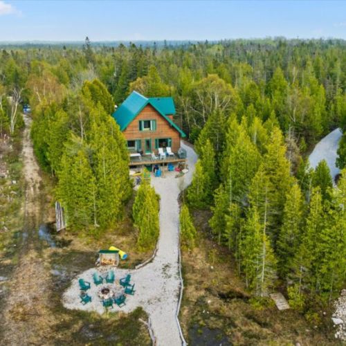 Waterfront campfires and peaceful views create the perfect Northern Ontario cottage experience.