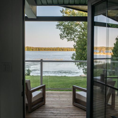 Step out to the deck and take in the calm water views right from your doorway.