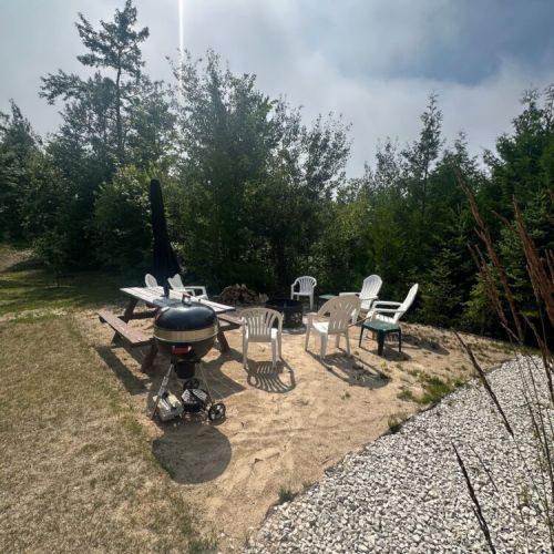 Smoke rises, sunset glows, and the warmth of the fire and good company fills the day/evening at Sunset Villa! Complete!