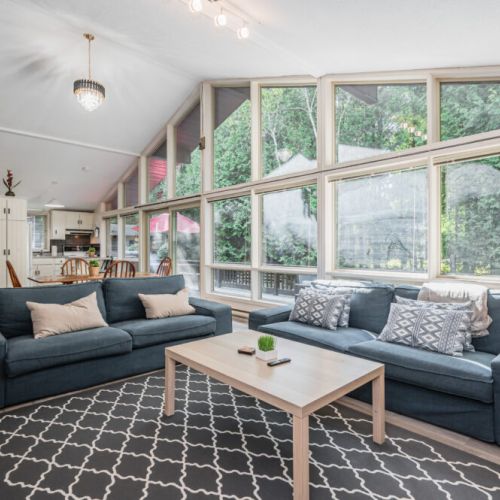 The sitting area is spacious and the large windows provide a truly stunning view.