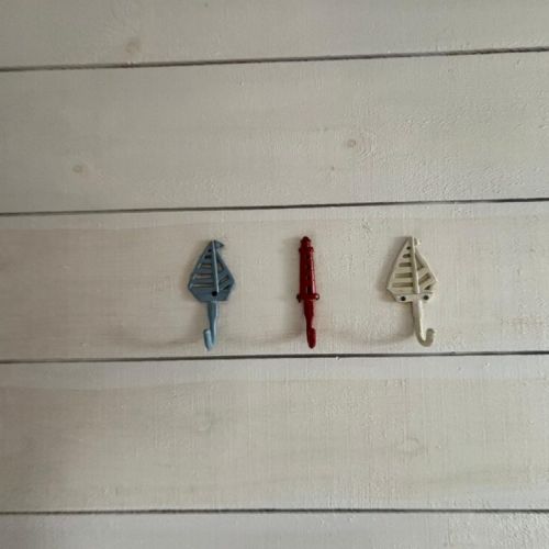 Playful, seaside-inspired hooks for hanging your essentials.