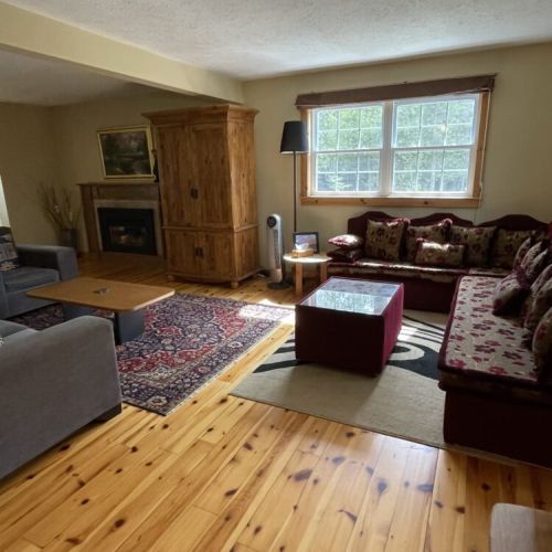 Cozy living room with fireplace—perfect for unwinding after a day outside