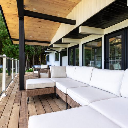 Outdoor sectional lounge made for long chats and relaxing after a day outside.