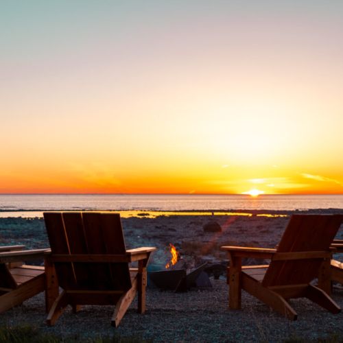 Immerse yourself in breathtaking Lake Huron views. This 1.1-acre property feels like an island retreat, with sounds of nature. Enjoy a spacious backyard, a separate fire pit, and the best sunset spot in Tobermory.