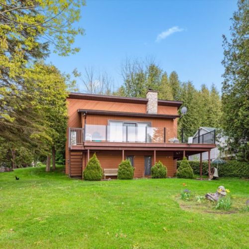 Tucked among the trees with views for days, this lakefront gem offers the perfect blend of seclusion, comfort, and cottage-country beauty.