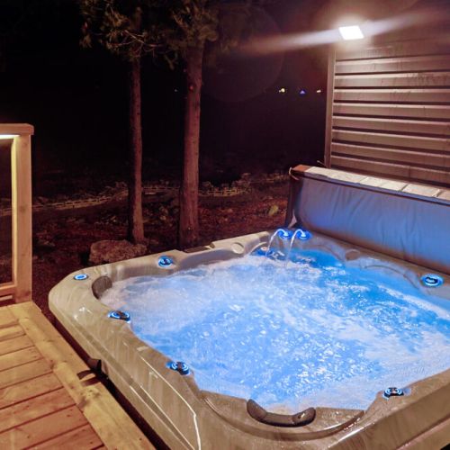 Unwind after dark: End your day exploring Tobermory with a relaxing soak in the hot tub.