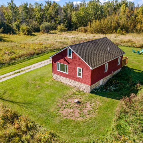 From above, Smith Homestead feels wonderfully secluded among the fields, forest and open countryside.