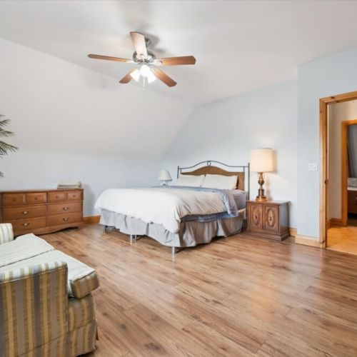 Bedroom 1: The spacious bedroom offers a comfortable queen bed and a calm, airy retreat after a day on the water.