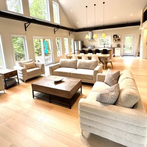 Gather, relax, and connect – the open-concept great room features cozy seating, soaring ceilings, and an airy layout perfect for making memories together.