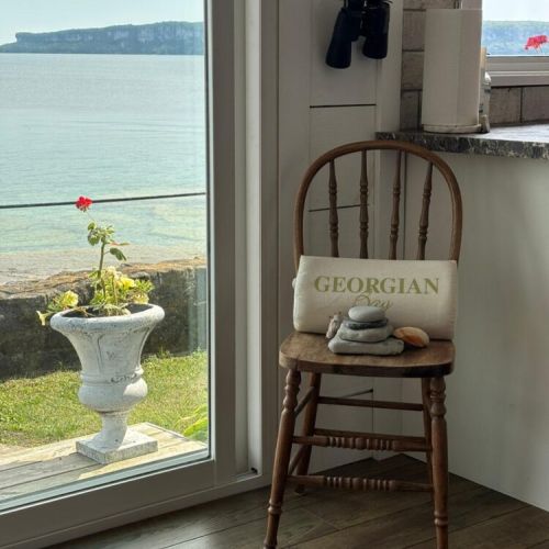 A chair by the kitchen window with sweeping Georgian Bay views.