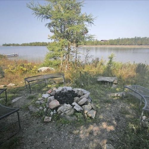 The cozy firepit by the water is amazing for catching the sunsets with a side of s'mores.