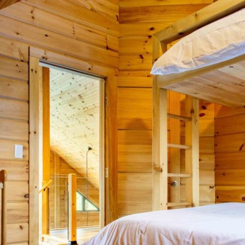 Spacious loft bedroom with flexible sleeping options.