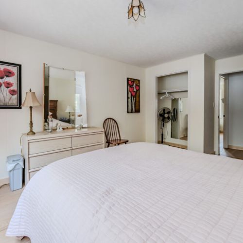 Another angle of the master bedroom, highlighting its spacious layout and thoughtful details designed for your comfort.