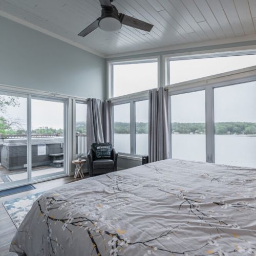 Bedroom 1: Wake up to breathtaking sunrises over the bay from the comfort of your bed.
