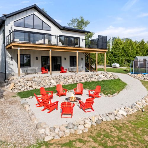 Gather around the fire pit and enjoy evenings under the stars with waterfront views.