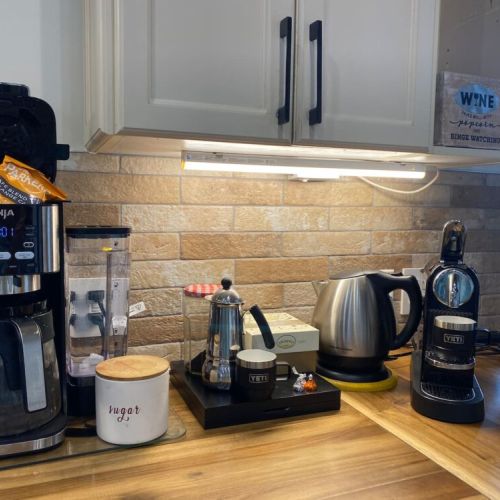 Enjoy the amenities throughout your stay: Mother Parker's Coffee, Starbucks pods, Nespresso (including decaf varieties), herbal teas, a real European-style espresso pot, sugar, sweeteners, and local honey – all complimentary for your entire stay!