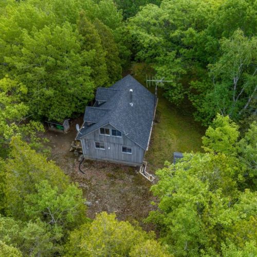 Bearfoot Lodge rests fully secluded on a private lot in the Cameron Lake - National Park Community.