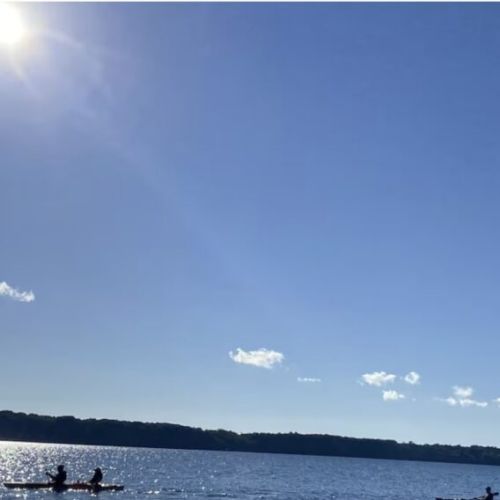 Soak in the endless blue of Colpoy's Bay under the sun with direct water access from the back of the property.