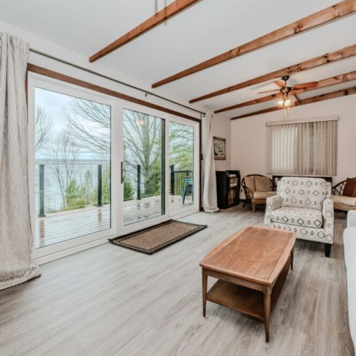Take in the beauty of Colpoy’s Bay from every corner of the living room, with sliding doors that lead directly to the deck and fresh Georgian Bay breezes.