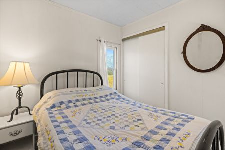 Natural light and peaceful country surroundings make this bedroom a relaxing place to start and end your day.