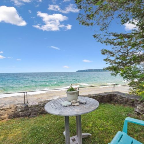 Relax in Adirondack chairs with the bay stretching out before you.