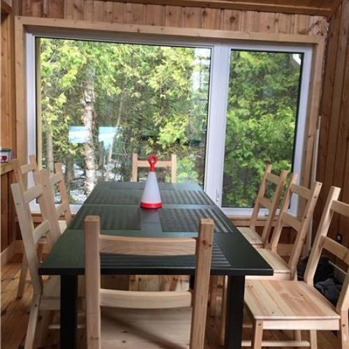 Dining space with direct access to the deck—perfect for indoor/outdoor meals.