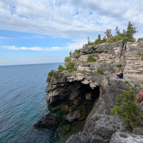 Explore the legendary Grotto—towering limestone cliffs and crystal-clear waters make this Bruce Peninsula must-see unforgettable.