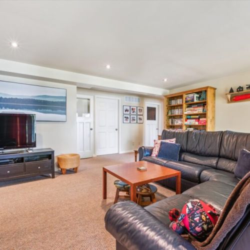 Entertainment space with board games and big screen TV—fun and relaxation for all ages.