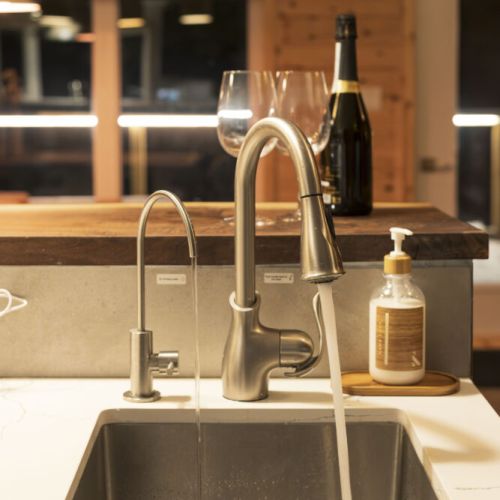RO Drinking Water: Prepare delicious meals with the highest quality water at this stunning cottage. The kitchen features a dedicated RO water system, ensuring you have access to clean and refreshing drinking water at your fingertips.
