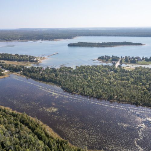 Panoramic view of the bay and nearby islands perfect for exploring by boat or kayak.