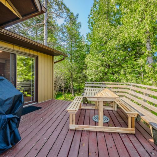 Fire up the grill and relax on the deck barbecue area with comfy seating. It’s an ideal space for outdoor cooking and enjoying those beautiful vacation evenings.