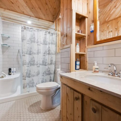 Clean, updated bathroom with a full shower and all essentials.