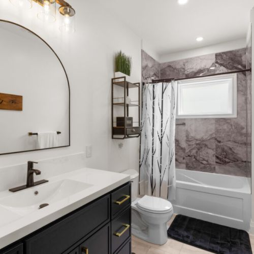 A second full bathroom provides extra convenience for larger groups.
