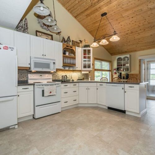 The fully equipped kitchen has everything you need, including a separate coffee bar.