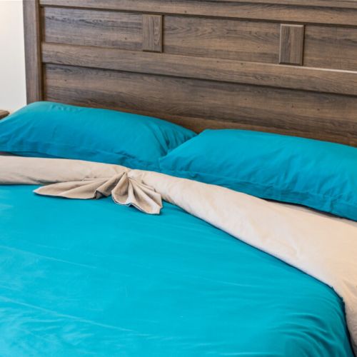 Soft linens and cozy bedding ensure a restful night's sleep.