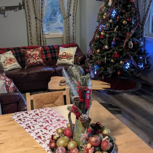Cozy up for the holidays—cottage charm meets festive warmth with seasonal decor and plenty of room for family cheer.