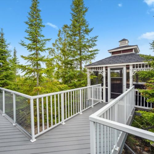14 feet above the lake, soak your worries away in the screened-in hot tub. Unwind beneath the stars or enjoy a morning dip with unbeatable sunrise views.