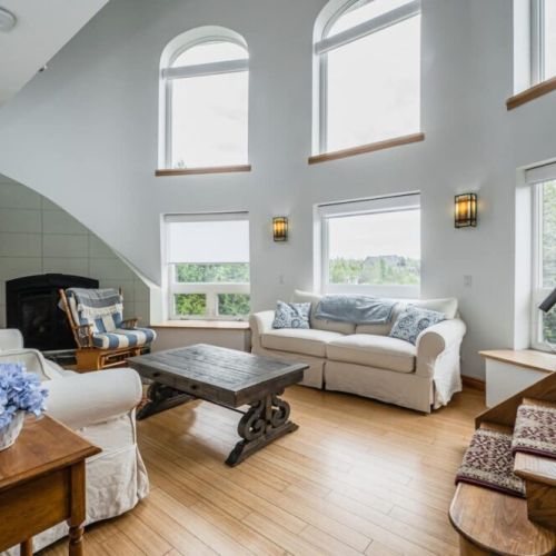 The second floor lounge features an airtight fireplace for cool evenings, comfortable couches and loungers to rest your feet or curl up with a book.