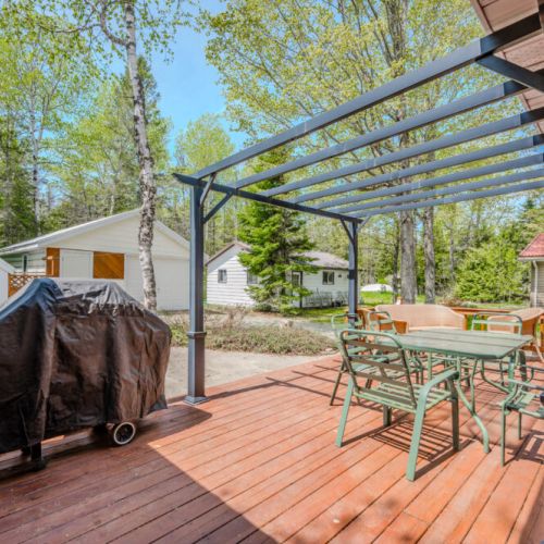 The deck's BBQ area is ideal for outdoor dining and enjoying the fresh air.