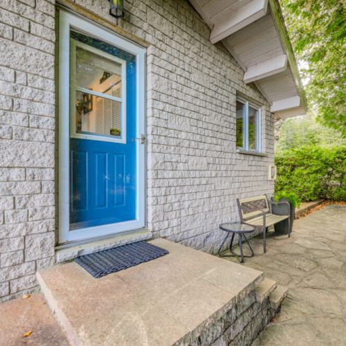 Step into Sunrise Retreat through its charming front porch. A warm, rustic getaway awaits inside, perfectly blending cottage charm with modern comfort, all just moments from local trails and amenities.