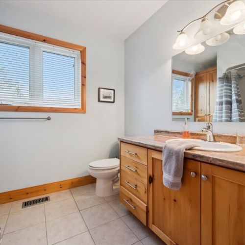 Spacious bathrooms with modern finishes provide comfort and convenience during your stay.