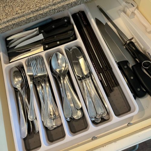 Fully stocked drawers with all the utensils and tools you’ll need — from sharp knives to serving spoons — making meal prep simple and stress-free.