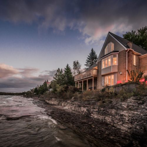 Cliffside waterfront property with stunning views of Georgian Bay, perched right by the water for unparalleled access to nature and tranquility. The perfect retreat for soaking in Bruce Peninsula’s famous sunsets and enjoying the peaceful ambiance of Lake Huron's rugged shoreline.
